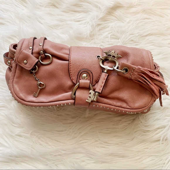 Juicy Couture Handbags - Juicy Couture Mauve Leather Clutch w/ Charms EUC